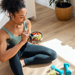 Woman doing yoga on floor